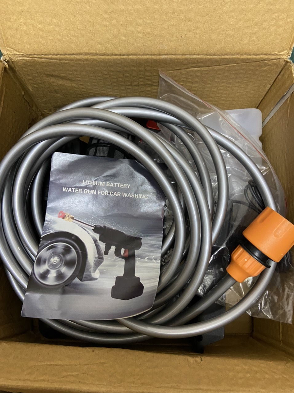 Ảnh thật của máy rửa xe mini cầm tay dùng pin MRX-1T2001